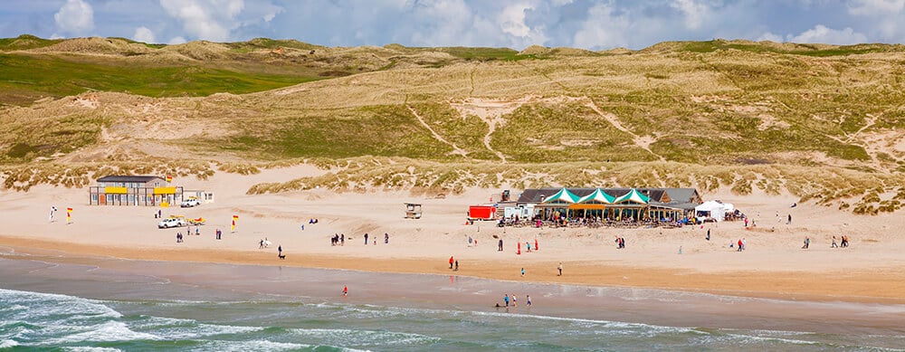 dog friendly beach cafés in Cornwall : Perranporth Beach showing The Watering Hole