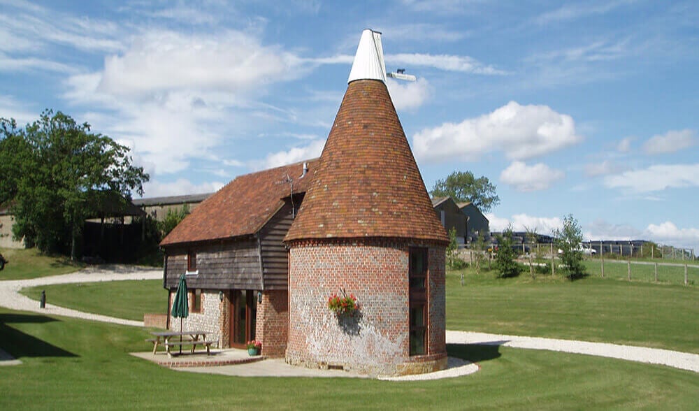 Christmas Cottages: The Oast House, unique to the original hop producing regions of the South East, dates from 1638
