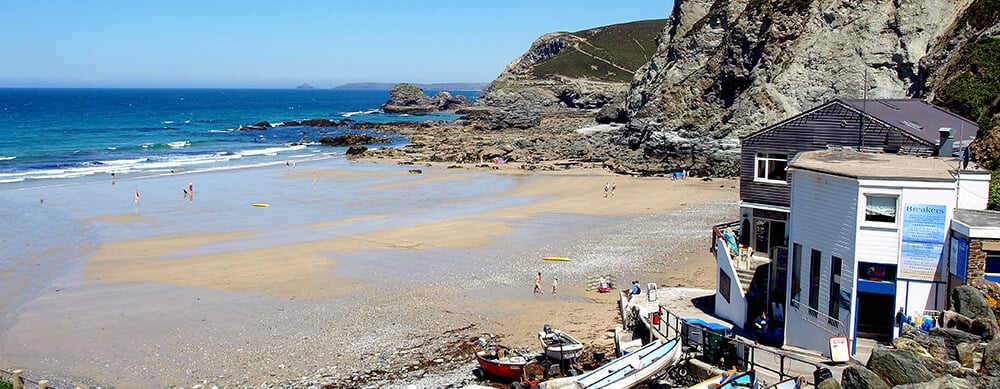 dog friendly beach cafés in Cornwall : Trevaunance Cove showing Schooners
